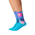 Lifestyle shot showing the Monet's Houses of Parliament at Sunset socks on a person's legs.