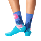 Back view of the Monet's Houses of Parliament at Sunset socks on a person's legs.