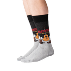 Lifestyle shot of a person wearing a pair of Nashville-themed socks.