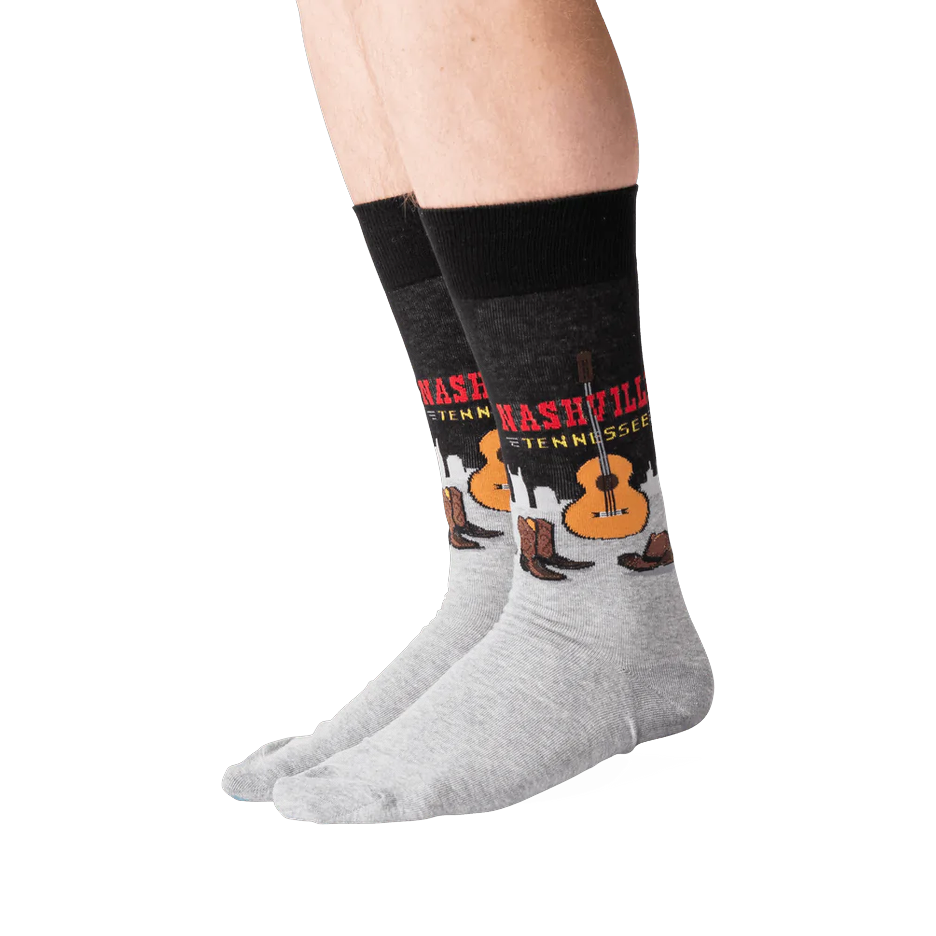 Lifestyle shot of a person wearing a pair of Nashville-themed socks.