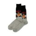 Pair of crew socks; black and grey with a Nashville, Tennessee design featuring a guitar, cowboy boots, and hats.