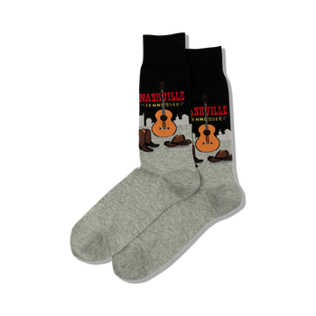black and gray crew socks with a pattern of guitars, cowboy boots, and cowboy hats in music city theme for men.  