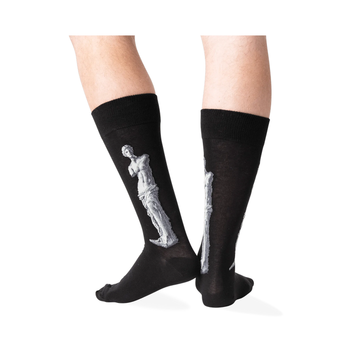 Back view of the Venus de Milo socks on a person's legs, showing the full design on the back of each sock.