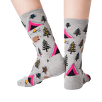 Back view of grey Bear Tent socks on a person's legs.