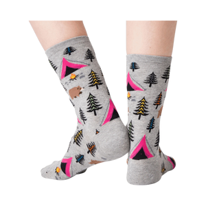 Back view of grey Bear Tent socks on a person's legs.