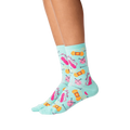 Lifestyle shot showing the socks on a person's legs against a black background.