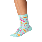 Lifestyle shot showing the socks on a person's legs against a black background.