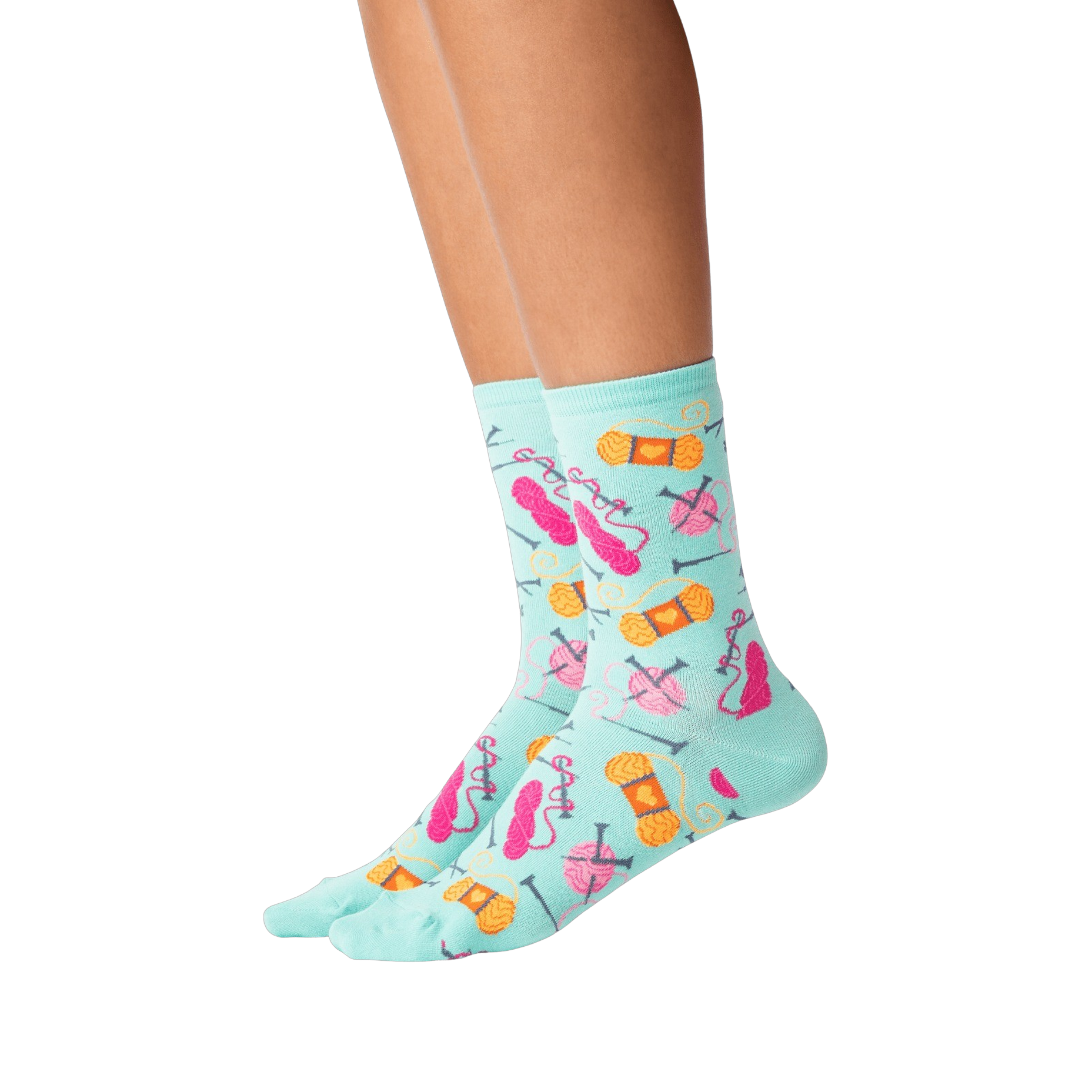 Lifestyle shot showing the socks on a person's legs against a black background.