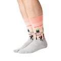 Lifestyle shot of a person wearing the New Orleans socks, showcasing how they look when worn.