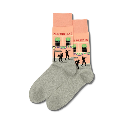 men's new orleans crew socks. pink, gray. pattern: bourbon street with musicians, lamp, building. music theme.  