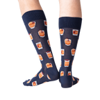 Flat lay image showing a pair of navy blue Old Fashioned cocktail socks.