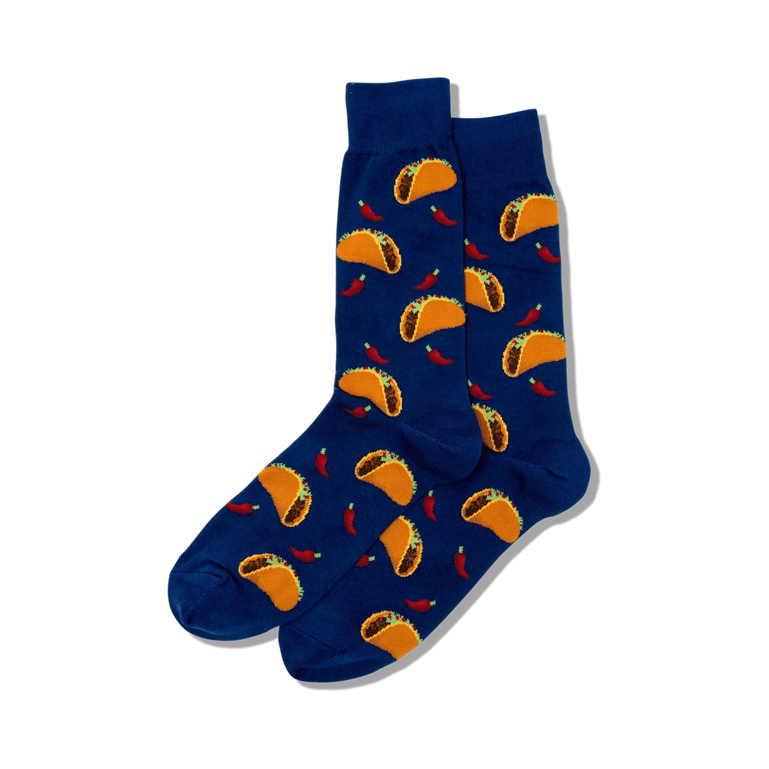 Lifestyle product shot showing a pair of blue crew socks with a taco and chili pepper print.