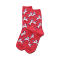 Close-up of coral crew socks with a pattern of white unicorns with purple manes and horns.