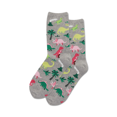 A pair of gray crew socks with a similar dinosaur design, but with pink, green and light gray dinosaurs.