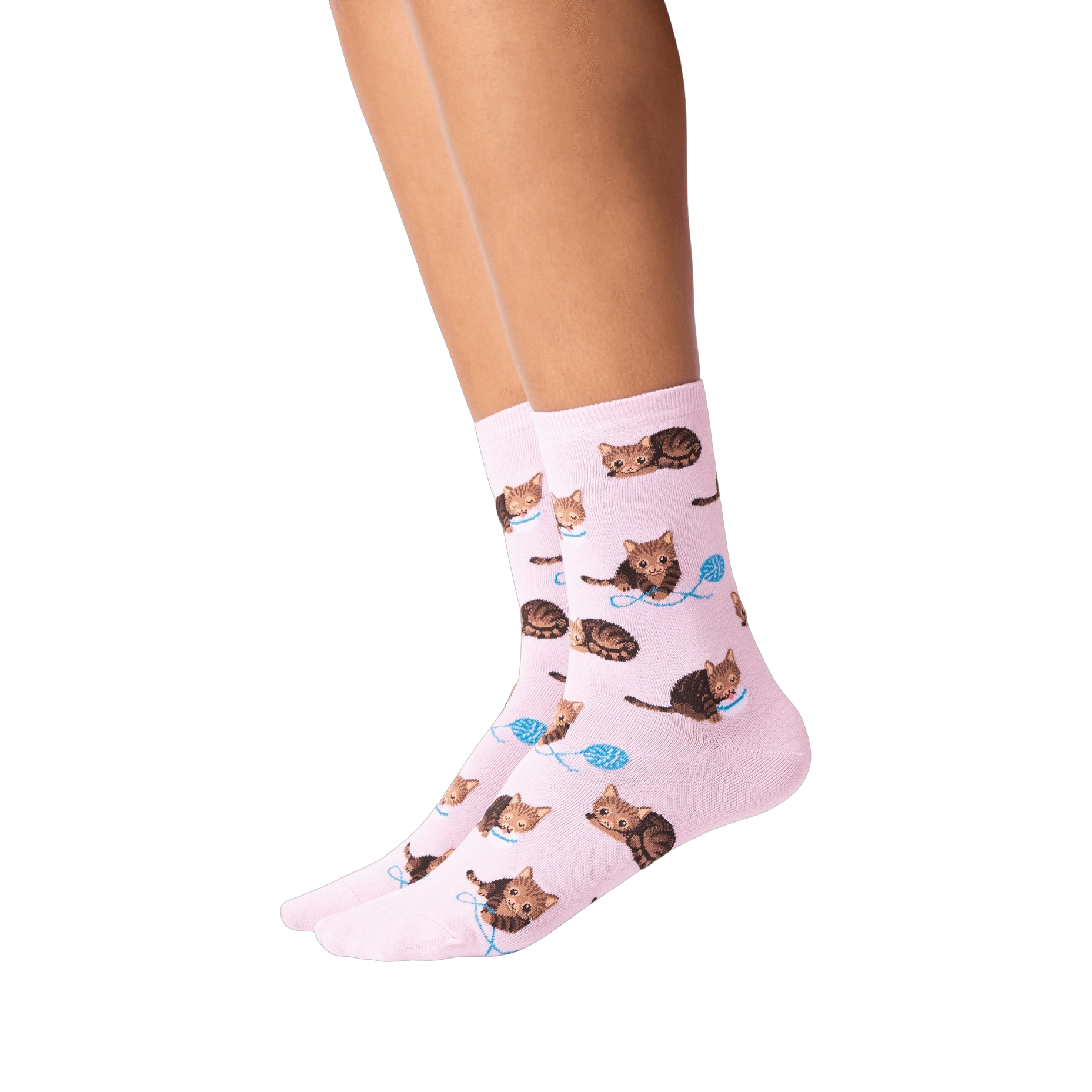 Lifestyle shot: Person's legs wearing pink socks with a repeating pattern of brown cats and yarn.