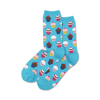 women's blue crew socks with a repeating pattern of pink, blue yellow, and brown cupcakes with frosting, a cherry or sprinkles on top.   