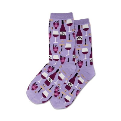 purple crew socks for women featuring a whimsical pattern of wine bottles, corkscrews, grapes, and wine glasses.  