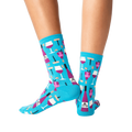 Back view of the teal wine socks on a person's legs.
