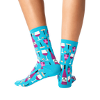 Back view of the teal wine socks on a person's legs.