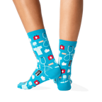 Back view of the teal medical socks on a person's legs. The socks are shown from the back, highlighting the pattern's wrap-around design.