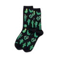 Pair of crew socks on black background.  Black socks feature a fun all-over print of green cacti with pink flowers.
