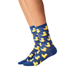 A pair of blue socks with a pattern of yellow rubber ducks.