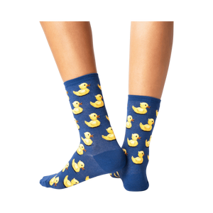 Close-up detail shot showcasing the yellow rubber duck design on the blue socks.