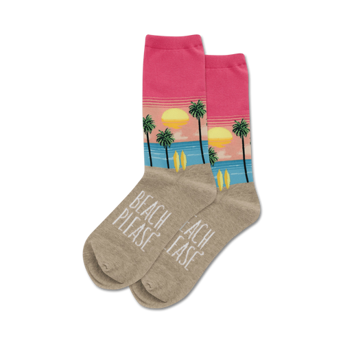 Pair of crew socks with a beach sunset design.  Pink and beige with palm trees, surfboards, and the words 'Beach Please'.