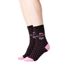 Lifestyle shot showing the 'Mrs. Always Right' socks on a woman's legs.
