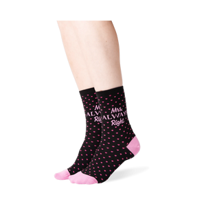 Lifestyle shot showing the 'Mrs. Always Right' socks on a woman's legs.