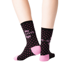 Back view of 'Mrs. Always Right' socks worn on a pair of legs.