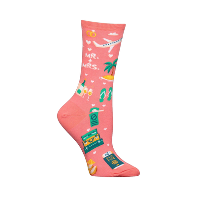 Coral pink crew socks with a honeymoon theme.  Design includes a plane, tropical island, flip-flops, champagne, wedding rings, passport, and suitcase.