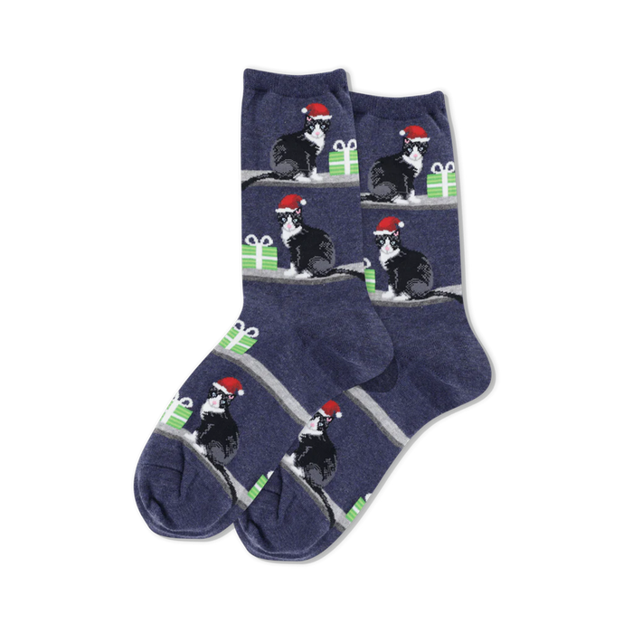 dark blue crew socks with a pattern of black cats wearing red santa hats on green presents for women   }}