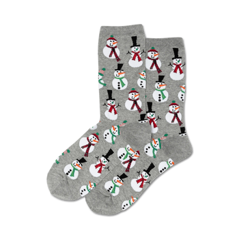Pair of crew socks, gray with repeating snowman design. Snowmen wear hats and scarves in red, green, and white.