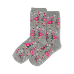 Pair of crew socks; grey background with pink flamingos wearing Santa hats and scarves, snowflakes.