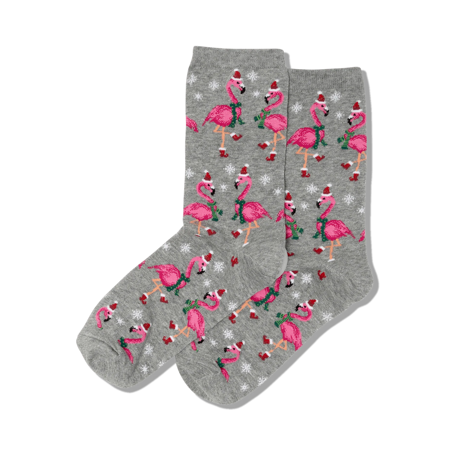 Pair of crew socks; grey background with pink flamingos wearing Santa hats and scarves, snowflakes.