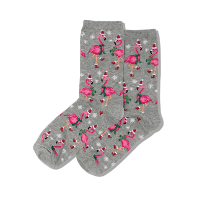 gray crew socks with santa claus hat and scarf-wearing pink flamingos and snowflakes.  