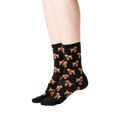 Lifestyle shot: A person's legs wearing the black poodle socks, showing the socks from the side.