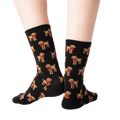 Back view:  The back of the black poodle socks, showcasing the full pattern.
