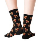 Back view:  The back of the black poodle socks, showcasing the full pattern.