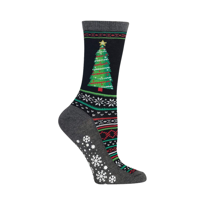 Crew socks in dark grey and black. Feature a green Christmas tree and snowflake pattern. Grippy bottom. }}