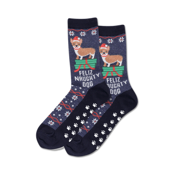 blue slipper socks with festive christmas dog design featuring a brown and white dog wearing a santa hat, snowflakes, and paw prints. anti-slip paw prints on the sole for added grip.  