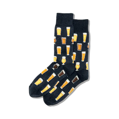 black crew socks with an allover pattern of different styles of beer glasses filled with beer in shades of yellow, brown, and tan.   