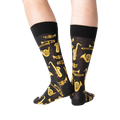 Back view of a person wearing black Jazz Instrument socks.