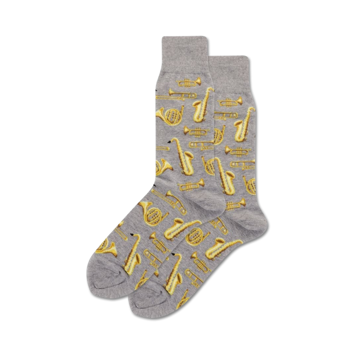 gray crew socks with gold-colored jazz instruments pattern for men.   