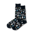 Pair of dark gray crew socks with an all-over print of laptops, calculators, coffee cups, and eyeglasses. 