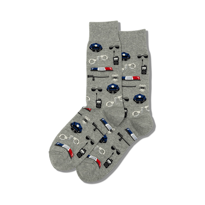 gray crew socks with a pattern of handcuffs, police hats, billy clubs, and walkie-talkies. fun socks for men who love cops and law enforcement.    