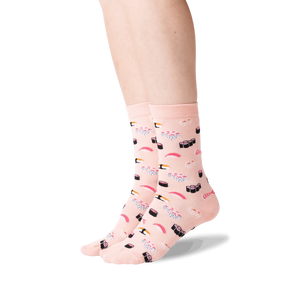 A pair of pink socks with a pattern of sushi.