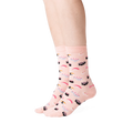 Close-up of a person wearing a pair of light pink sushi socks.