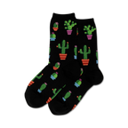 Pair of crew socks in black with a repeating pattern of potted cacti in various colors and sizes.